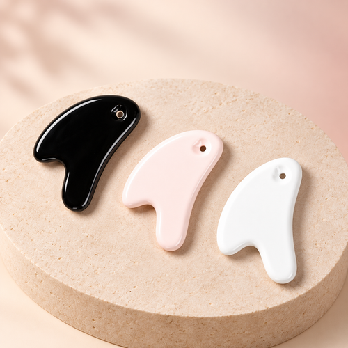 Ceramic Gua Sha Facial Tool in black, pink and white